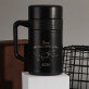Žena ako nie z tohto sveta - Termohrnček  s rukoväťou 400 ml